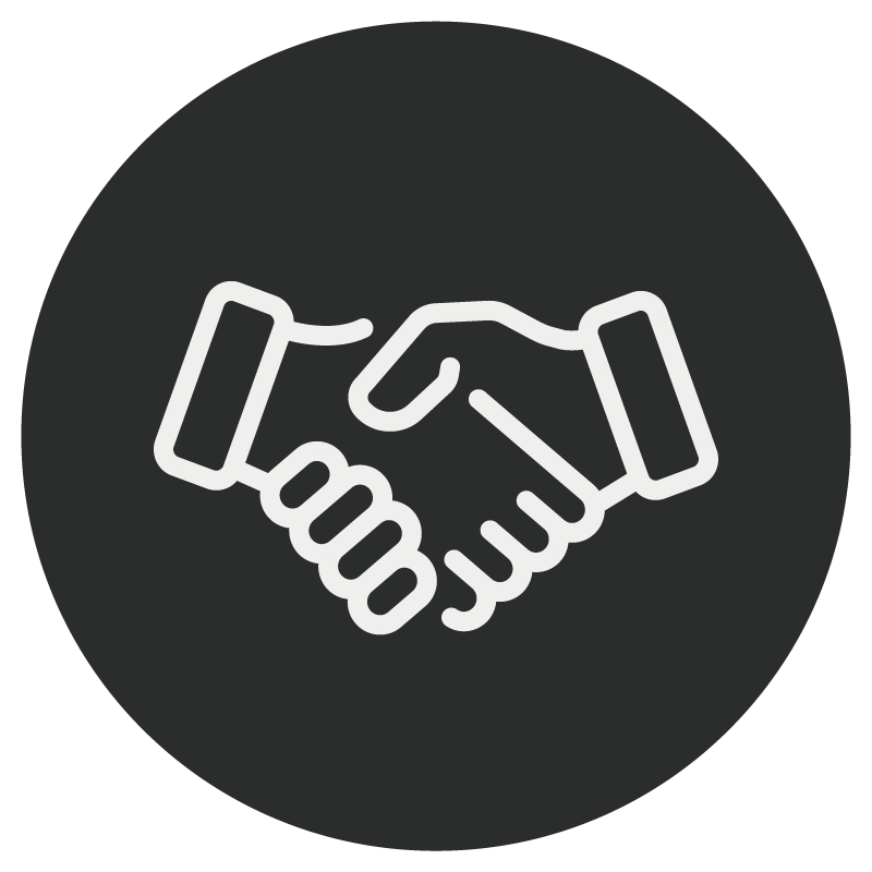 Icon of two hands shaking within a black circular background, signifying agreement or partnership, perfect for promoting church consulting services.